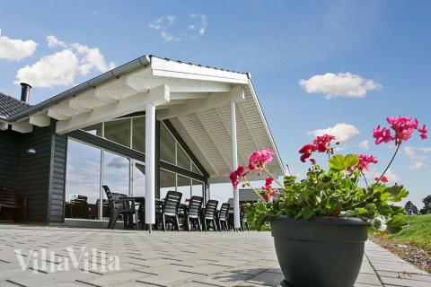 Genießen Sie einen Grillabend auf der Terrasse des Luxusferienhauses Nr. 322 in Fünen und seine Inseln