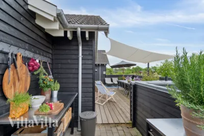 Luxusferienhaus mit Innenpool Nr. 323 in Tisvildeleje, Nordseeland – Whirlpool, Sauna und Aktivitätsraum mit Playstation und Dart, Dänemark