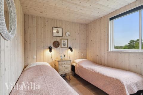 Eines der 6 Schlafzimmer im Luxusferienhaus Nr. 323