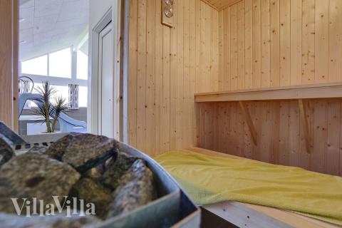 Genießen Sie die heiße Sauna im Luxusferienhaus Nr. 324 für 18 Personen