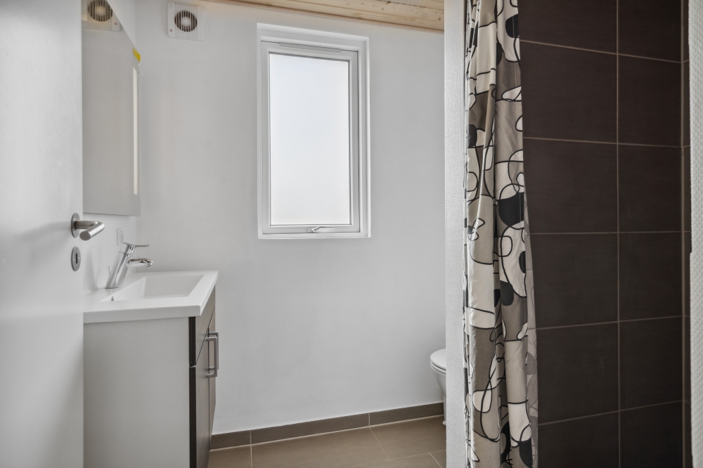 Eines der Badezimmer im Luxusferienhaus Nr. 324