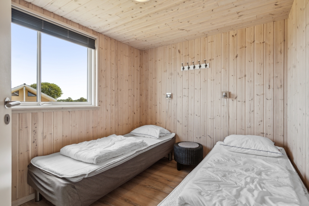 Eines der 7 Schlafzimmer im Luxusferienhaus Nr. 324