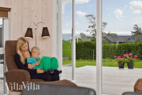 Die Couchecke im Luxusferienhaus Nr. 327 in Fünen und seine Inseln.