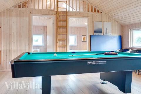 Das Luxusferienhaus 326 für 12 Personen hat einen großen Aktivitätsraum mit u. a. Billard und Darts