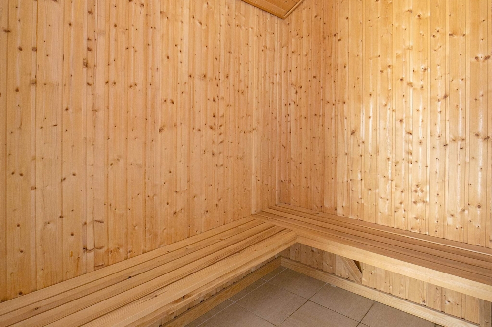 Genießen Sie die heiße Sauna im Luxusferienhaus Nr. 326 für 12 Personen