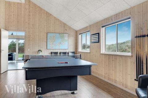 Das Luxusferienhaus 328 für 18 Personen hat einen großen Aktivitätsraum mit u. a. Billard und Darts