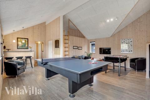 Neben den vielen schönen Stunden, die man im Poolbereich des Hauses verbringen kann, bietet das Luxusferienhaus 328 auch Spielevergnügen bei Billard/Tischtennis und Darts