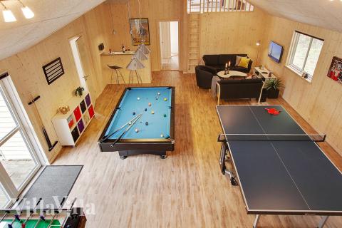 Neben den vielen schönen Stunden, die man im Poolbereich des Hauses verbringen kann, bietet das Luxusferienhaus 330 auch Spielevergnügen bei Billard/Tischtennis und Darts