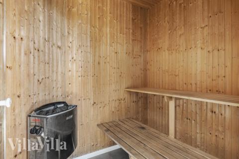 Genießen Sie die heiße Sauna im Luxusferienhaus Nr. 332 für 20 Personen