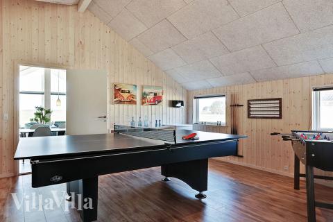 Das Luxusferienhaus 336 für 14 Personen hat einen großen Aktivitätsraum mit u. a. Billard und Darts