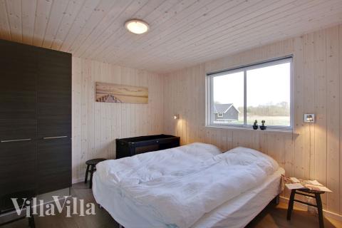 Eines der 9 Schlafzimmer im Luxusferienhaus Nr. 335