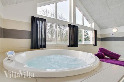 Genießen Sie den warmen Whirlpool im Luxusferienhaus Nr. 337 in Fünen und seine Inseln
