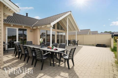 Genießen Sie einen Grillabend auf der Terrasse des Luxusferienhauses Nr. 338 in Fünen und seine Inseln