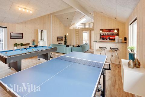 Neben den vielen schönen Stunden, die man im Poolbereich des Hauses verbringen kann, bietet das Luxusferienhaus 340 auch Spielevergnügen bei Billard/Tischtennis und Darts