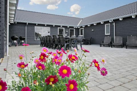 Das Luxusferienhaus Nr. 340 hat eine tolle Terrasse, die mit hochwertigen Gartenmöbeln für 22 Personen ausgestattet ist.
