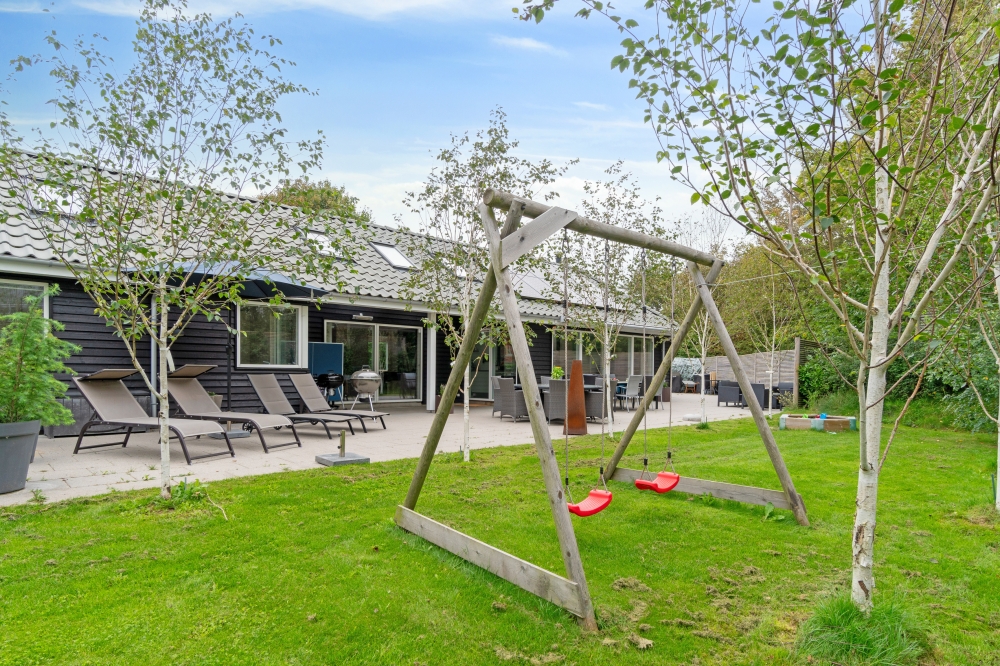 Das Luxusferienhaus Nr. 339 hat eine tolle Terrasse, die mit hochwertigen Gartenmöbeln für 16 Personen ausgestattet ist.