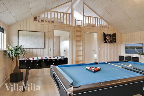 Neben den vielen schönen Stunden, die man im Poolbereich des Hauses verbringen kann, bietet das Luxusferienhaus 341 auch Spielevergnügen bei Billard/Tischtennis und Darts
