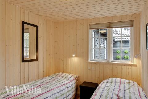 Eines der 9 Schlafzimmer im Luxusferienhaus Nr. 342