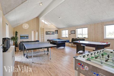 Neben den vielen schönen Stunden, die man im Poolbereich des Hauses verbringen kann, bietet das Luxusferienhaus 343 auch Spielevergnügen bei Billard/Tischtennis und Darts