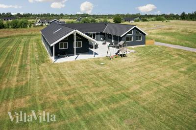 Dieses schöne Poolhaus Nr. 343 mit Platz für 20 Personen liegt in Lolland/Falster/Mön