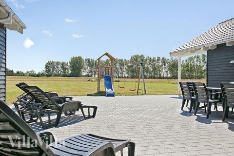 Das Luxusferienhaus Nr. 343 hat eine tolle Terrasse, die mit hochwertigen Gartenmöbeln für 20 Personen ausgestattet ist.