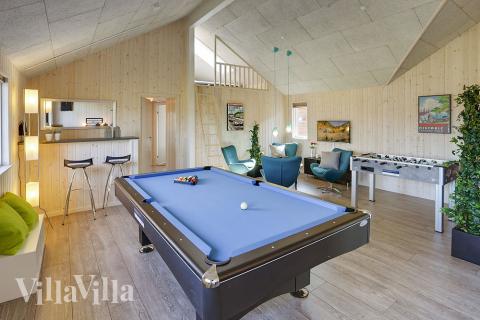 Neben den vielen schönen Stunden, die man im Poolbereich des Hauses verbringen kann, bietet das Luxusferienhaus 344 auch Spielevergnügen bei Billard/Tischtennis und Darts