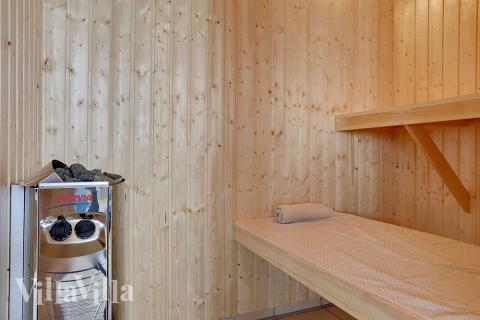 Genießen Sie die heiße Sauna im Luxusferienhaus Nr. 344 für 16 Personen