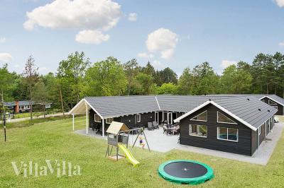Dieses schöne Poolhaus Nr. 346 mit Platz für 22 Personen liegt in Nordseeland