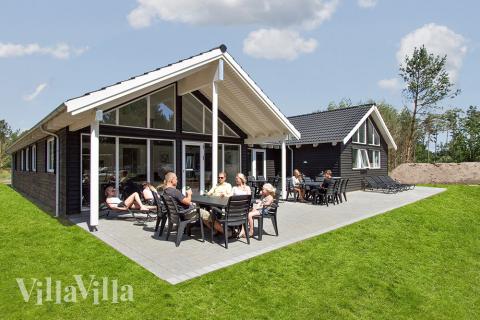 Das Luxusferienhaus Nr. 347 hat eine tolle Terrasse, die mit hochwertigen Gartenmöbeln für 18 Personen ausgestattet ist.