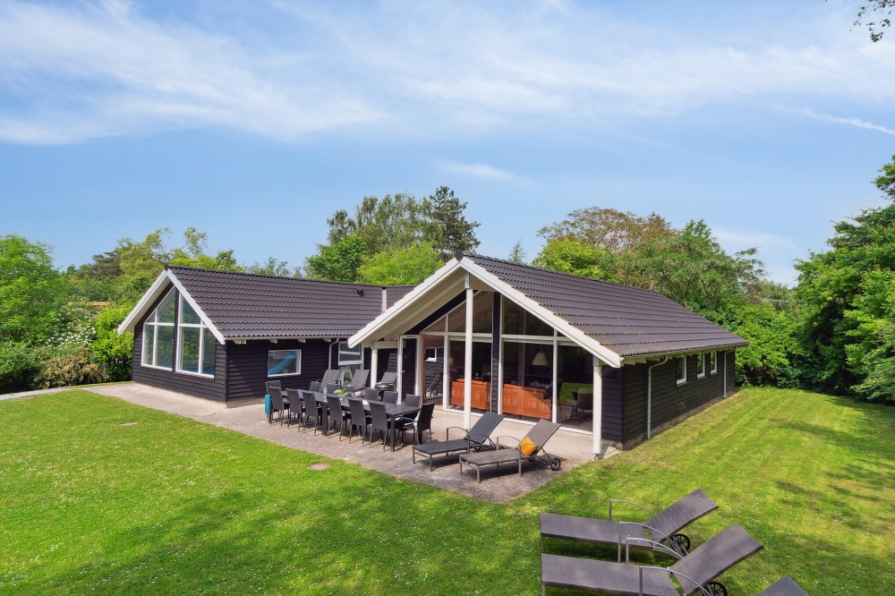 Dieses schöne Poolhaus Nr. 352 mit Platz für 14 Personen liegt in Nordseeland