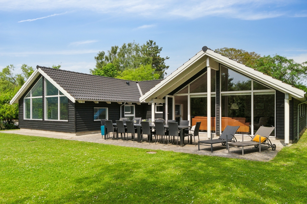 Das Luxusferienhaus Nr. 352 hat eine tolle Terrasse, die mit hochwertigen Gartenmöbeln für 14 Personen ausgestattet ist.