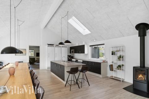 Aufenthaltsraum mit Platz für 24 im Luxusferienhaus Nr. 350.