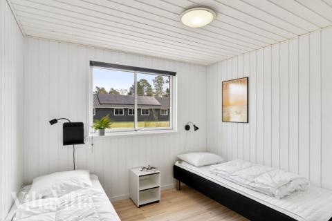 Eines der 9 Schlafzimmer im Luxusferienhaus Nr. 350