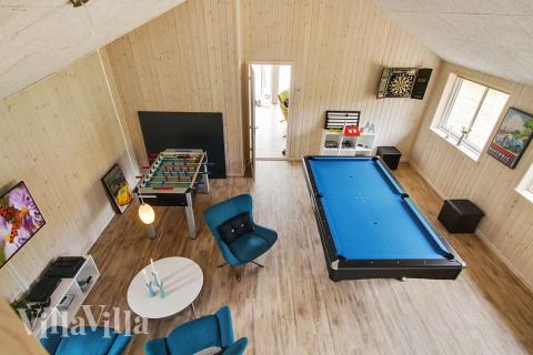 Neben den vielen schönen Stunden, die man im Poolbereich des Hauses verbringen kann, bietet das Luxusferienhaus 355 auch Spielevergnügen bei Billard/Tischtennis und Darts