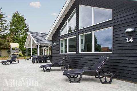 Das Luxusferienhaus Nr. 355 hat eine tolle Terrasse, die mit hochwertigen Gartenmöbeln für 18 Personen ausgestattet ist.