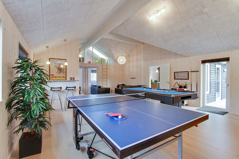 Neben den vielen schönen Stunden, die man im Poolbereich des Hauses verbringen kann, bietet das Luxusferienhaus 356 auch Spielevergnügen bei Billard/Tischtennis und Darts