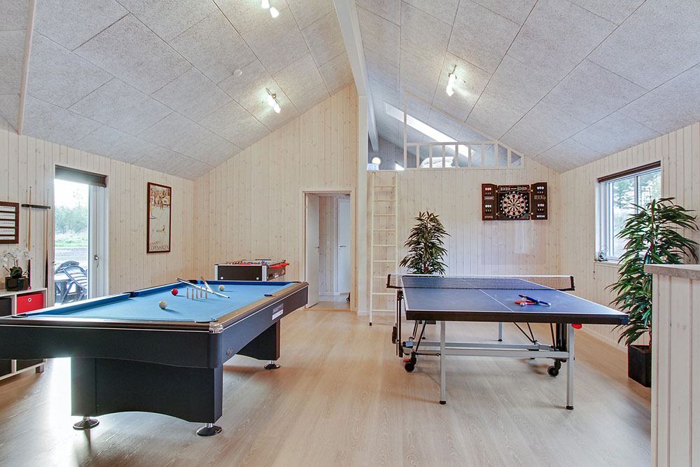 Aktivitätsraum im Luxusferienhaus Nr. 356 mit 8 Schlafzimmern und Platz für 20 Gäste.