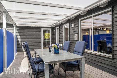 Genießen Sie einen Grillabend auf der Terrasse des Luxusferienhauses Nr. 356 in Ostjütland
