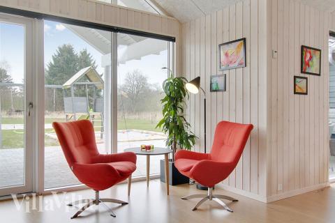 Aufenthaltsraum mit Platz für 18 im Luxusferienhaus Nr. 358.