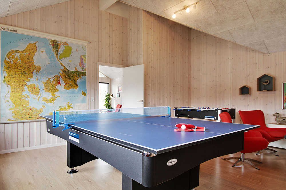 Das Luxusferienhaus 358 für 18 Personen hat einen großen Aktivitätsraum mit u. a. Billard und Darts
