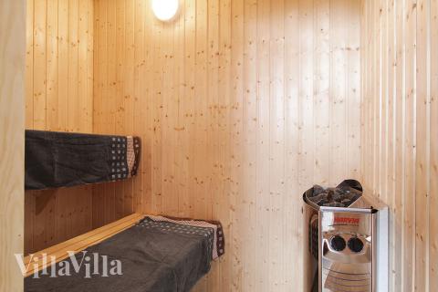 Genießen Sie die heiße Sauna im Luxusferienhaus Nr. 358 für 18 Personen