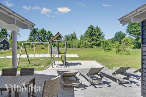 Genießen Sie einen Grillabend auf der Terrasse des Luxusferienhauses Nr. 358 in Ostjütland