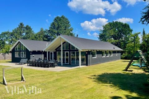 Dieses schöne Poolhaus Nr. 361 mit Platz für 18 Personen liegt in Nordseeland