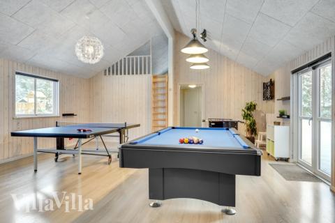 Neben den vielen schönen Stunden, die man im Poolbereich des Hauses verbringen kann, bietet das Luxusferienhaus 362 auch Spielevergnügen bei Billard/Tischtennis und Darts