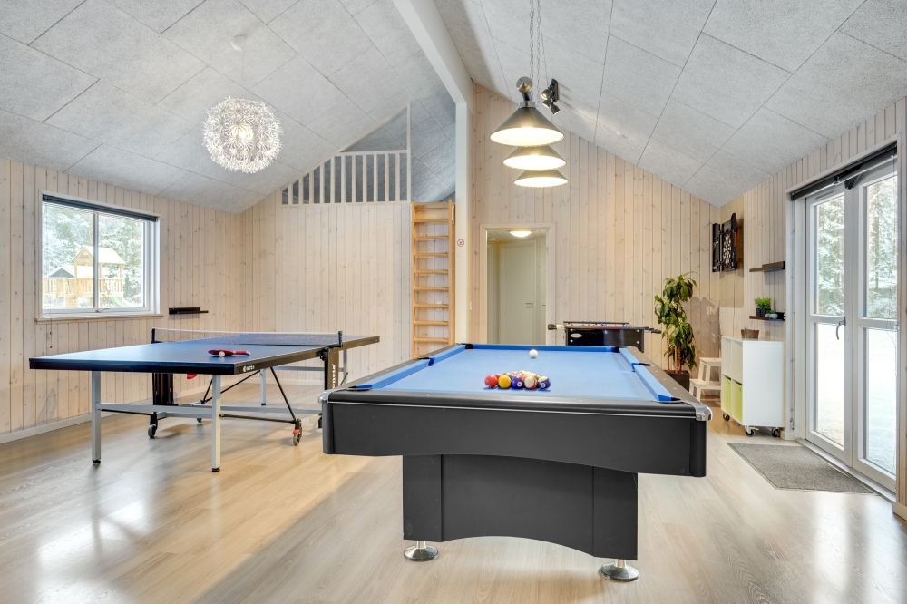 Neben den vielen schönen Stunden, die man im Poolbereich des Hauses verbringen kann, bietet das Luxusferienhaus 362 auch Spielevergnügen bei Billard/Tischtennis und Darts