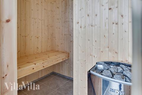 Genießen Sie die heiße Sauna im Luxusferienhaus Nr. 366 für 14 Personen