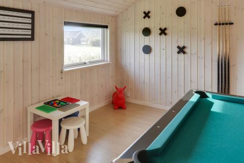 Das Luxusferienhaus 366 für 14 Personen hat einen großen Aktivitätsraum mit u. a. Billard und Darts