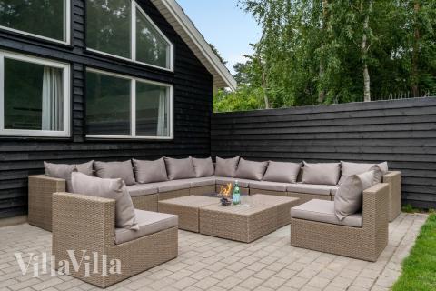 Genießen Sie einen Grillabend auf der Terrasse des Luxusferienhauses Nr. 365 in Nordseeland