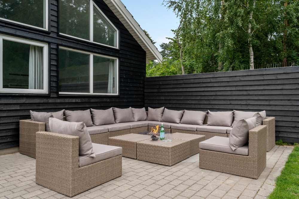 Genießen Sie einen Grillabend auf der Terrasse des Luxusferienhauses Nr. 365 in Nordseeland