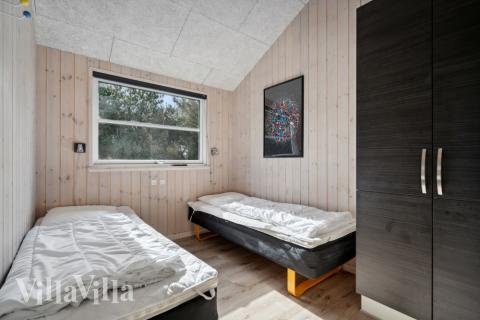 Eines der 9 Schlafzimmer im Luxusferienhaus Nr. 371